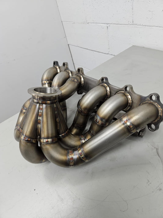 
Manifold 2JZ Top mount V-Band Westgate au besoin 2jz
 high-performance